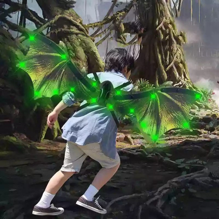 بال دایناسور اسباب بازی پوشیدنی چراغ دار و موزیکال مدل Dinosaur Wings برای کودکان در ال آی تویز